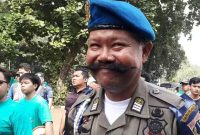 D.Suryadi Anggota Satpol PP Kota Jakarta Selatan yang selalu bergaya drngan kumis nyentriknya. (foto. ist)