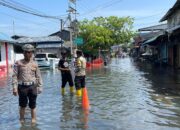 Fenomena Banjir Rob, Polres Bintan Mengatur Lalulintas dan Bantu Evakuasi Warga Sekitar